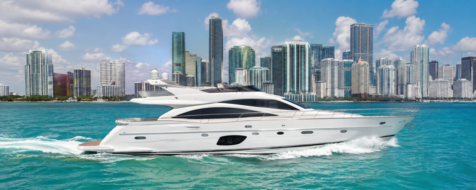 Luxury motor yacht cruising Biscayne Bay with the Miami skyline
