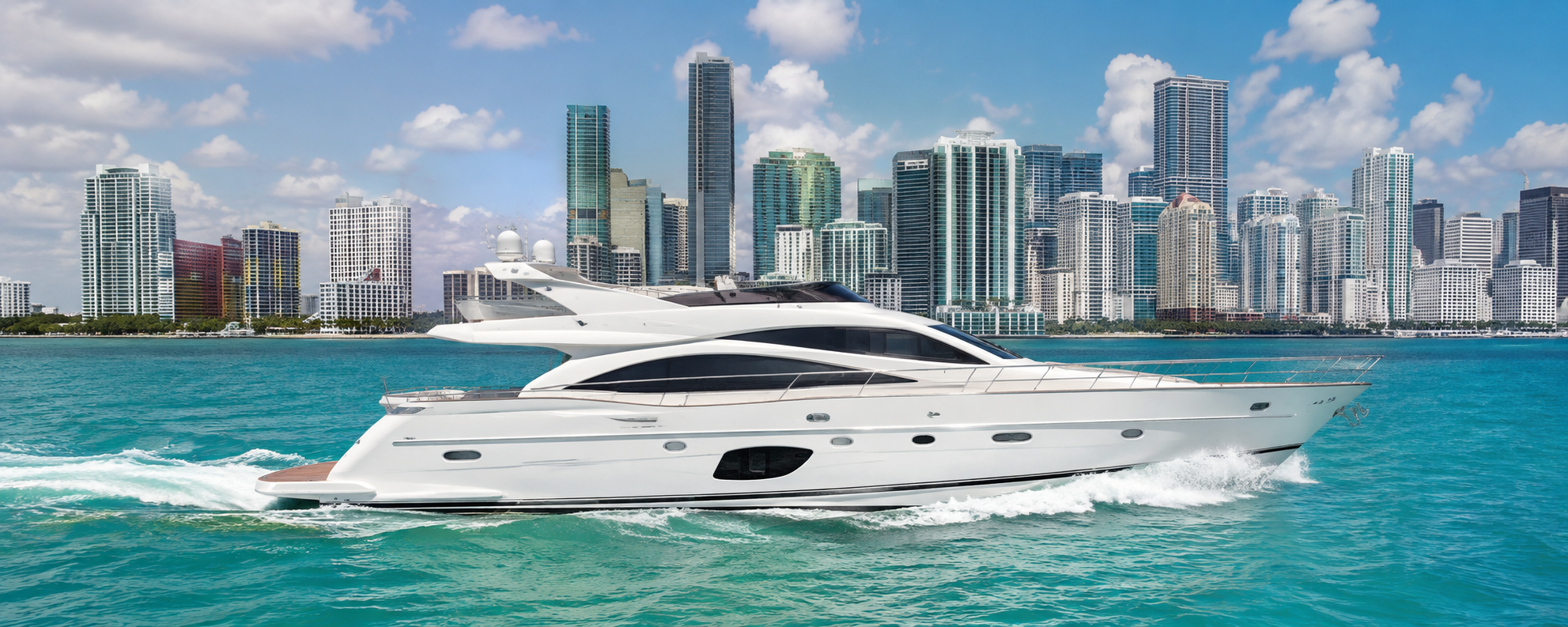 Luxury motor yacht cruising Biscayne Bay with the Miami skyline